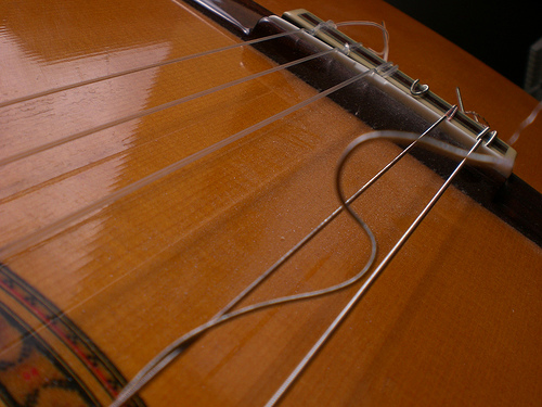 why do I keep breaking my guitar strings
