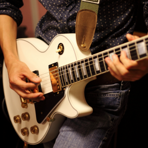 Holding the Guitar