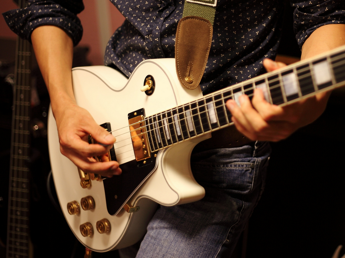 Holding the Guitar